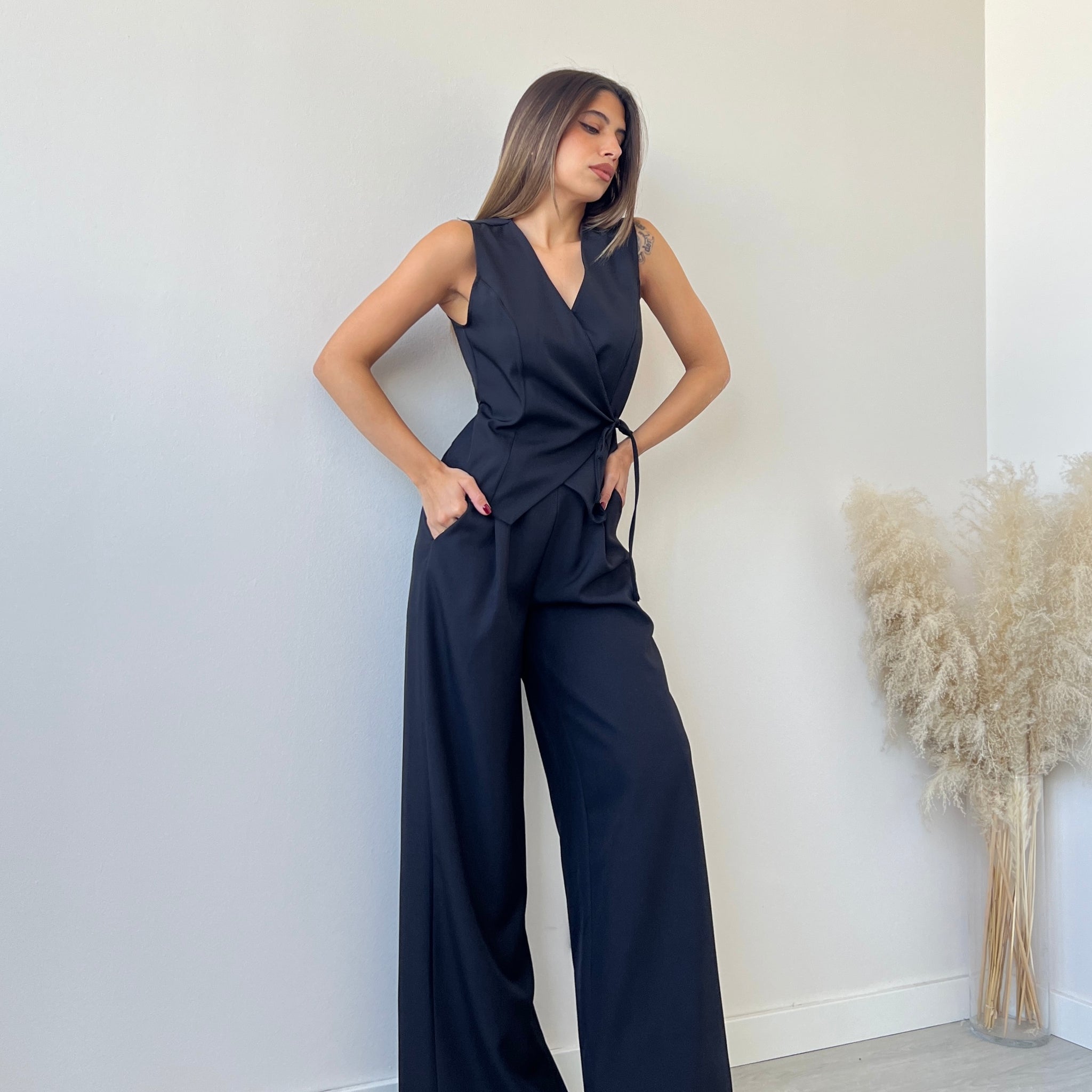 Set gilet a portafoglio + pantalone palazzo nero