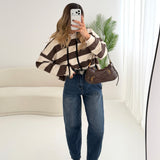 Jeans mom fit con cintura con cuore