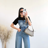 T-shirt con corpetto in jeans con lacci sul retro nera