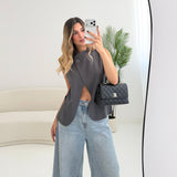 Blazer smanicato obliquo con bottone grey